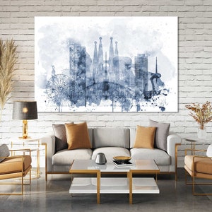 May include: A watercolor painting of the Barcelona skyline in shades of blue and gray. The painting features iconic landmarks like the Sagrada Familia and the Barceloneta beach.