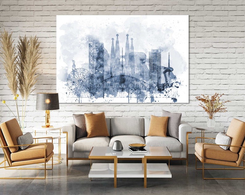 May include: A watercolor painting of the Barcelona skyline in shades of blue and gray. The painting features iconic landmarks like the Sagrada Familia and the Barceloneta beach.