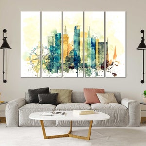 May include: A watercolor painting of a city skyline with a Ferris wheel in the foreground. The buildings are painted in shades of blue, yellow, and orange. The painting is divided into five panels.