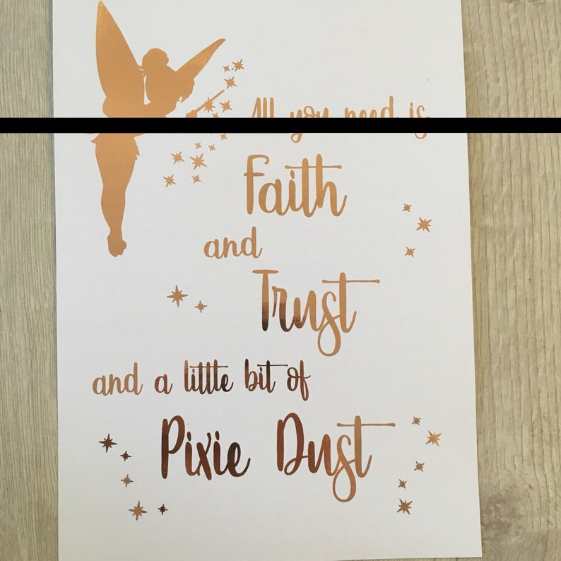 May include: A gold glitter print with a silhouette of Tinkerbell and the quote "All you need is faith and trust and a little bit of pixie dust".