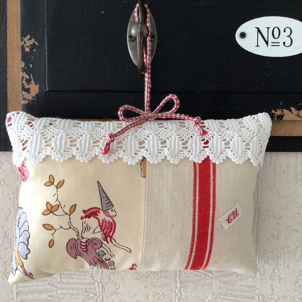 Coussin de porte en tissus vintages