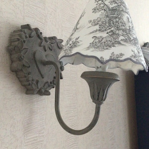 Wall light with toile de jouy lampshade