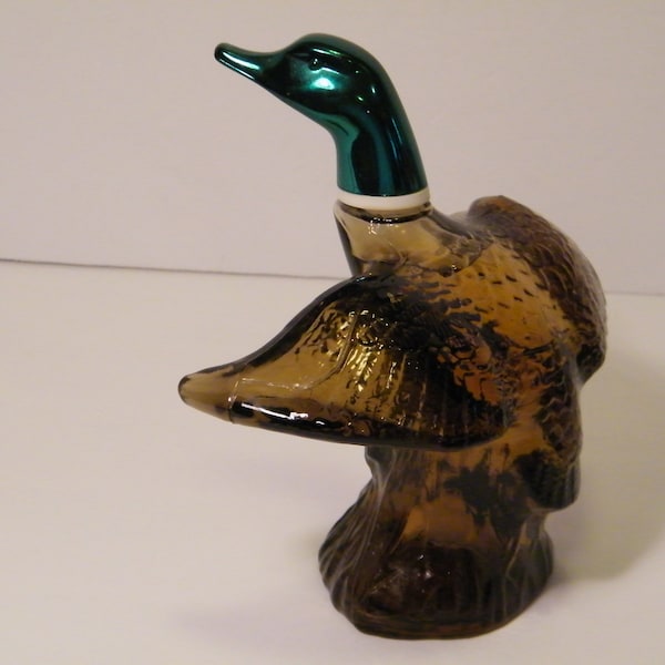 Avon Mallard In Flight Duck Shape Bottle with Tai Winds Aftershave still inside, Vintage 1970s collectible decanter, appears to be full 5 oz