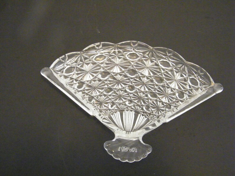 Vintage 1970s jewelry tray or trinket dish, Avon Fan Shape Glass Tray in Button and Daisy pattern