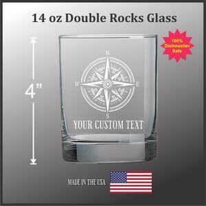 May include: A clear 14 oz double rocks glass, 4 inches tall, with a white compass rose design and space for custom text. The glass is dishwasher safe and made in the USA.