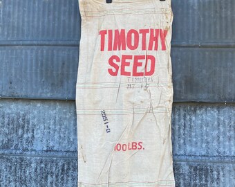 Vintage Timothy Seed Sack 100-pound sack.  Great project bag in good shape. Medium weight Cotton linen red, green pinstripes craft feed sack
