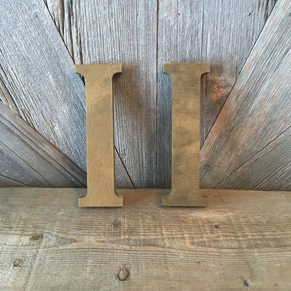 Large gold distressed letter