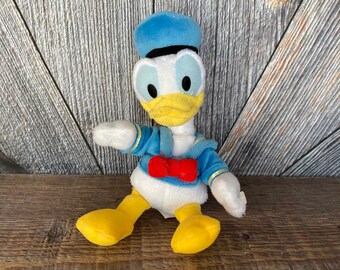 Donald Duck 65th Anniversary Bean Bag Set Plush 65 Fiesty Years 4 Hat Disney for sale online 