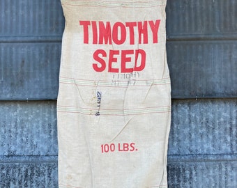 Vintage Timothy Seed Sack 100-pound sack.  Great project bag in good shape. Medium weight Cotton linen red, green pinstripes craft feed sack
