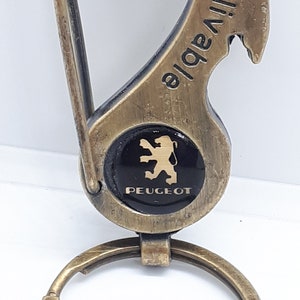 Peugeot - logo France auto company car, auto, automotive, metal keychains !