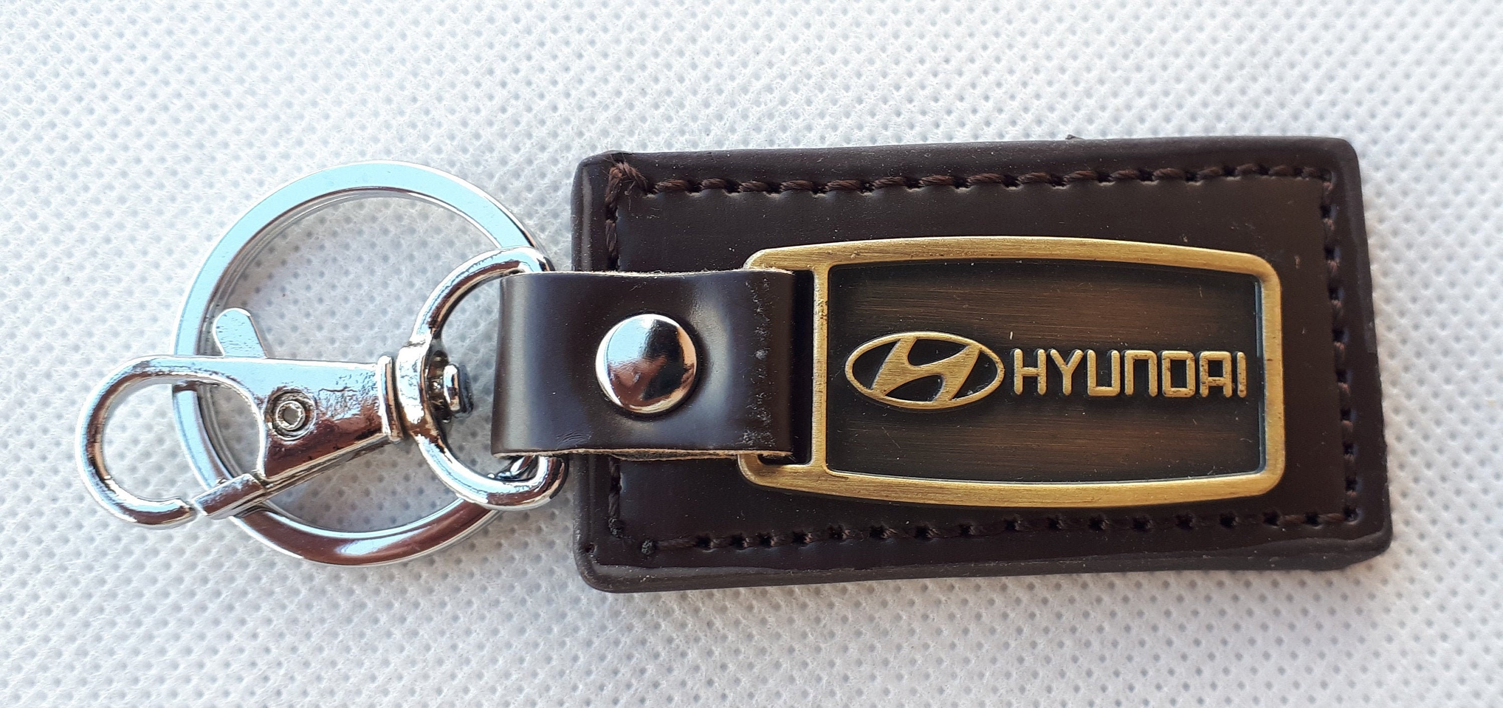 Original Hyundai Schlüsselanhänger Anhänger Logo beige HMD00542-2