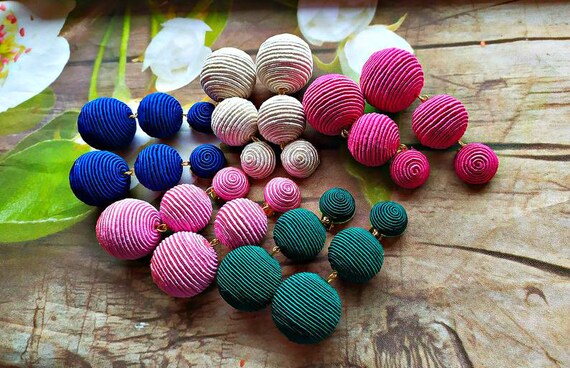 Three ball drop earrings shop