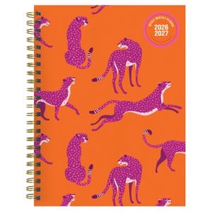 May include: A spiral-bound planner with a vibrant orange cover featuring a repeating pattern of purple cheetahs. The planner includes a gold spiral binding and a circular sticker indicating the years 2026 and 2027. The planner is designed for weekly and monthly planning.