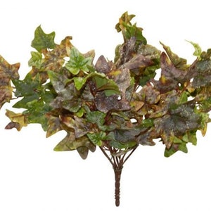 May include: A bunch of artificial ivy with green and brown leaves. The leaves have a frosted look and are arranged in a cluster.