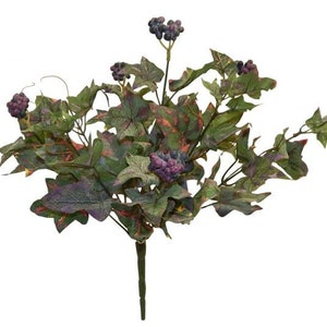 May include: Artificial grapevine bush with green and purple leaves and dark purple berries.