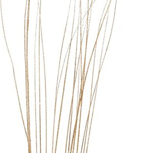 May include: A bunch of gold glitter stems, perfect for adding a touch of sparkle to your craft projects or floral arrangements.
