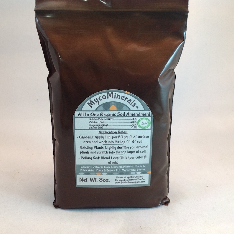 May include: Brown bag of MycoMinerals All In One Organic Soil Amendment with a list of ingredients and application rates. The bag is 8 ounces and contains volcanic trace elements, minerals, humic and fulvic acids, yucca, and endo+ ecto mycorrhizal spores.