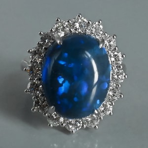 Rare Large Black Opal Halo Ring 18k