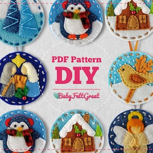 Peut inclure: Neuf décorations de Noël en feutre avec différents motifs, dont un pingouin, un oiseau, une maison, une scène de la Nativité et un ange. Les décorations sont toutes rondes et ont un fond blanc avec des coutures bleues autour des bords. Le texte "PDF Pattern DIY BabyFeltGreat" est au centre de l'image.