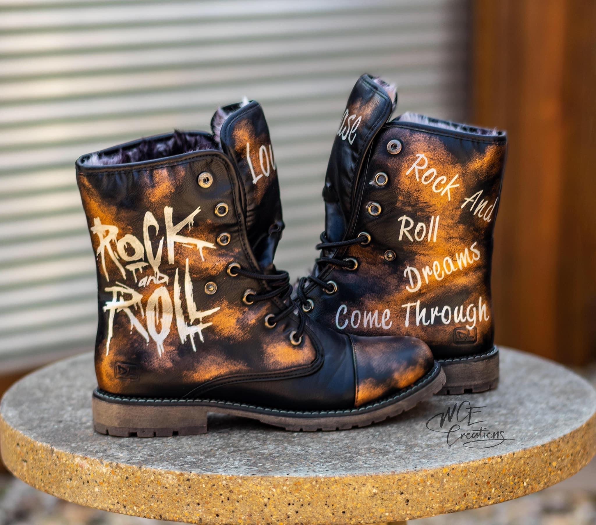 combat boots with gold accents