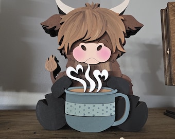 Highland Cow with coffee