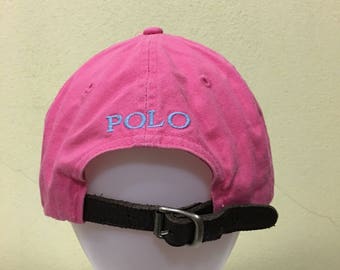 pink polo hat with leather strap
