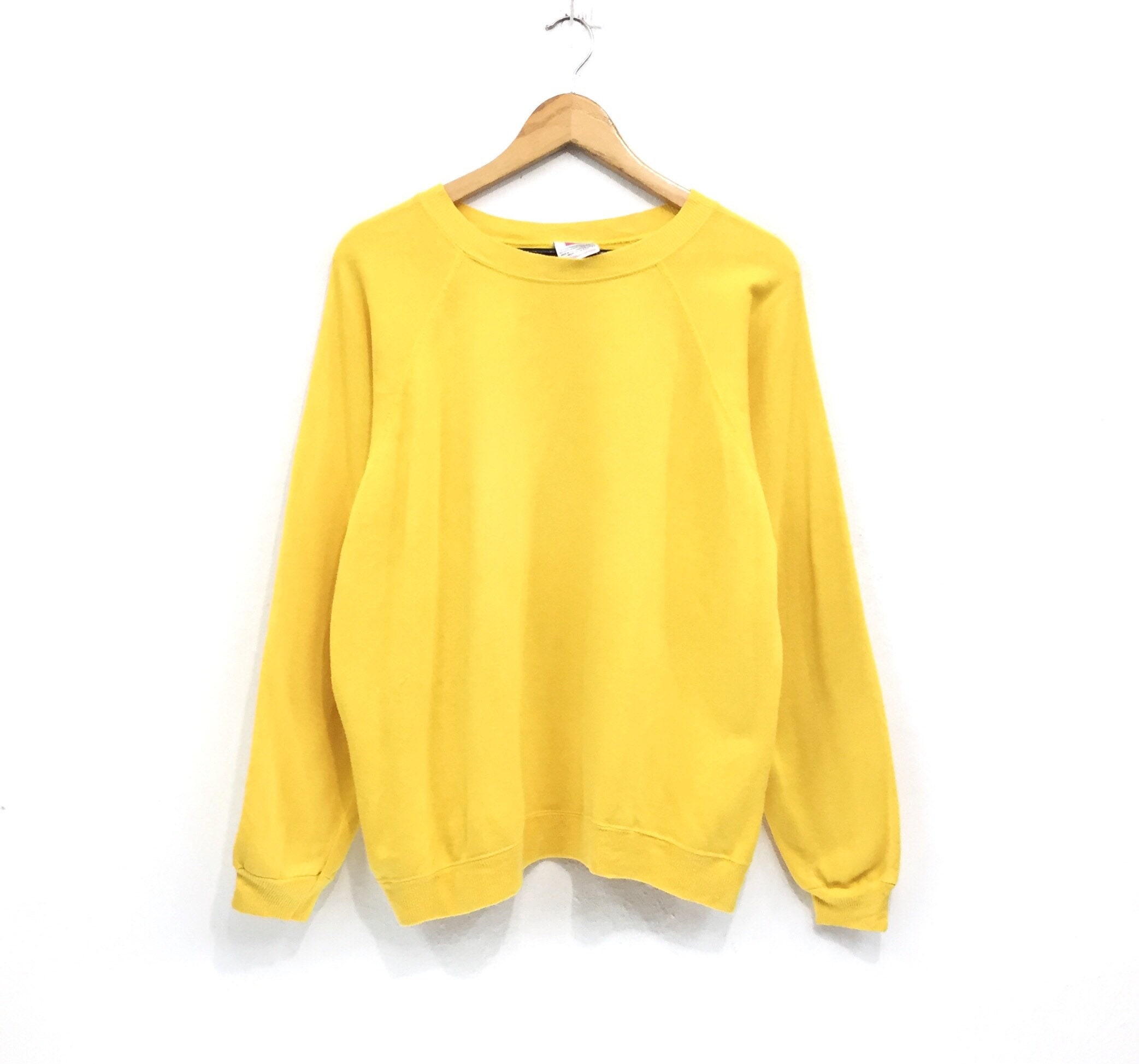 plain yellow sweatshirt