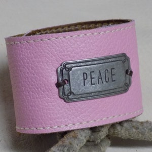 Just Your Size Light Pink Wide Leather Cuff Bracelet with Peace Metal Tag