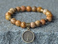 Stability and Consciousness,Picture Jasper Gemstone Bracelet,Tree of Life Bracelet,Mala Bracelet,Yoga Bracelet,Meditation Bracelet,Japa Mala product logo