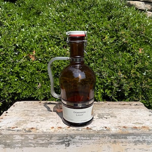 Old Dominion Brewing Company Amber Glass 2 Liter Beer Growler with Swing Top Lid - 13&quot; Tall