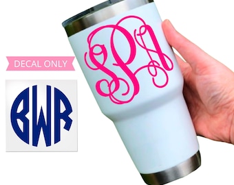 May include: A white stainless steel tumbler featuring a large, hot pink cursive monogram decal. A separate square graphic displays a dark blue circular monogram with the letters BWR. The text DECAL ONLY is visible.