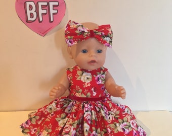 17 inch  Baby Doll Clothes / Dress “ Inca flower theme  fabric Dress with Bow Fits Baby Born Dolls . Handmade  Designer.