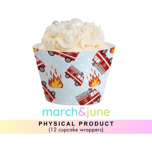 May include: Red and white fire truck cupcake wrappers with a blue background and white polka dots. The wrappers are for a party or event.