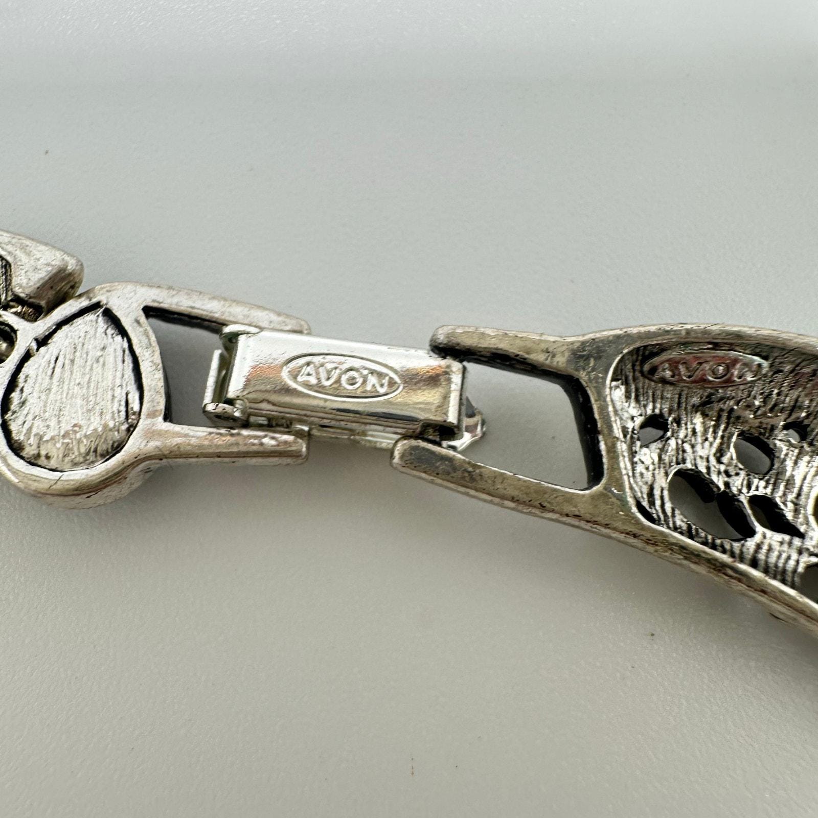 Vintage Avon silver and cat eye watch SOLD) Avon” ladies silver toned quartz watch. Condition-Good  main image 4