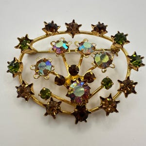 Austria vintage gold tone fall colors AB rhinestones starburst brooch