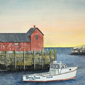May include: A white fishing boat with the name "Kerrie Jean" and the text "Rockport" on the side, docked at a pier with a red wooden building in the background. The boat has a number "790DK" on the side.