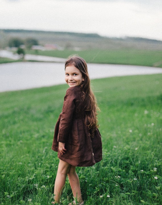 Linen dress for girls with long sleeves on the lining and buttons on the back