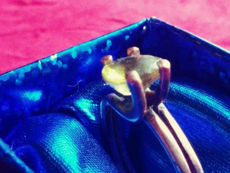 Engaging US size 10 14 Citrine on Copper in an engagement-style setting