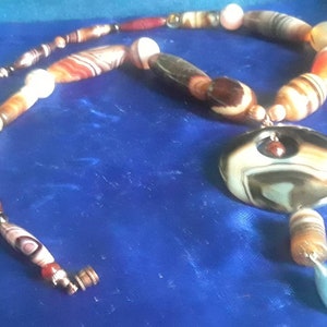 BotsWanna Weara Nice Necklace? - Large Graduated Natural Brown Banded Botswana Agate Tube & Round Beaded Necklace with Donut Dangle Amulet