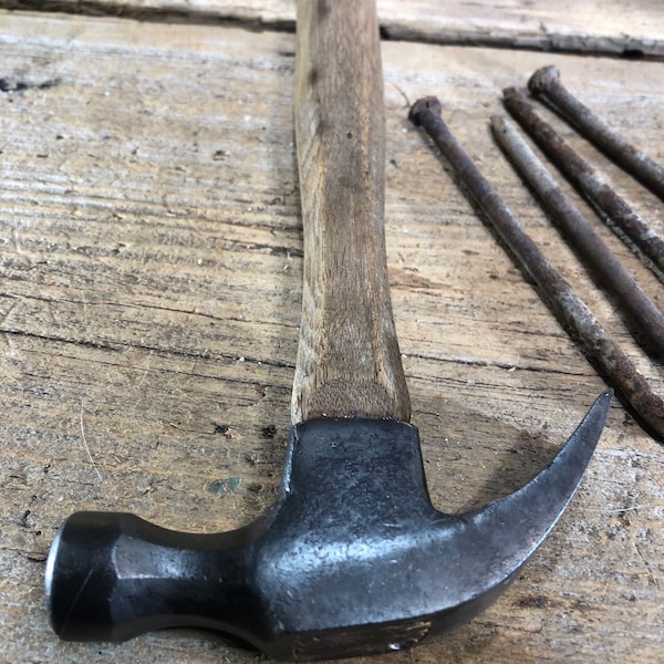 Vintage claw hammer, hickory handle. vintage tool, hammerhead, farm hammer