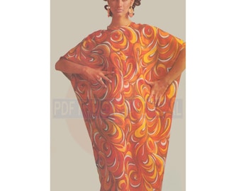 May include: A woman wearing a long, orange and yellow patterned dress with a swirling design. The dress has a round neckline and long sleeves.