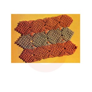 May include: A woven macrame wall hanging with a geometric pattern in shades of brown and green.