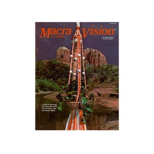 May include: Macrame Vision Lee Originals magazine cover featuring a colorful macrame plant hanger with white beads and orange and white tassels. The magazine cover also features a scenic background of a river and mountains.