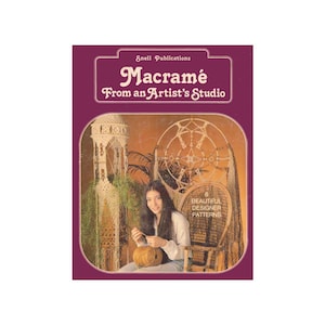 May include: A vintage book cover for "Macramé From an Artist's Studio" by Snell Publications. The cover is a deep purple with the title in a decorative font. The image features a woman working on macramé with macramé projects in the background.