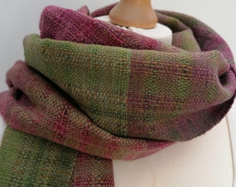 A versatile hand woven scarf. Soft and light weight for every seasons of the year in shades of moorland heathers and greens.