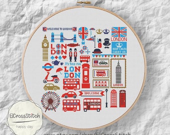May include: A cross-stitch embroidery hoop featuring a London-themed design. The design includes iconic symbols like the Big Ben clock tower, red double-decker buses, and the Union Jack flag. Text includes "WELCOME TO LONDON" and "KEEP CALM CARRY ON".