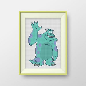 May include: A framed cross-stitch of a cartoon monster in shades of teal and purple. The monster is waving with a friendly smile. The artwork is in a light green frame, ready to hang.