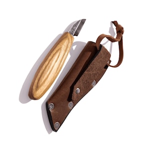 May include: A small carving knife with a wooden handle and a leather sheath. The sheath has a strap and metal rivets.