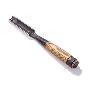May include: A wood-handled chisel with a metal blade and a rounded tip. The handle is made of light brown wood with a dark brown metal ferrule.