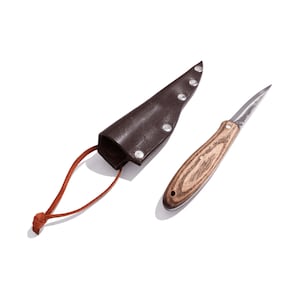 May include: A small, brown leather knife sheath with a brown leather strap and a small, wooden-handled knife with a silver blade.
